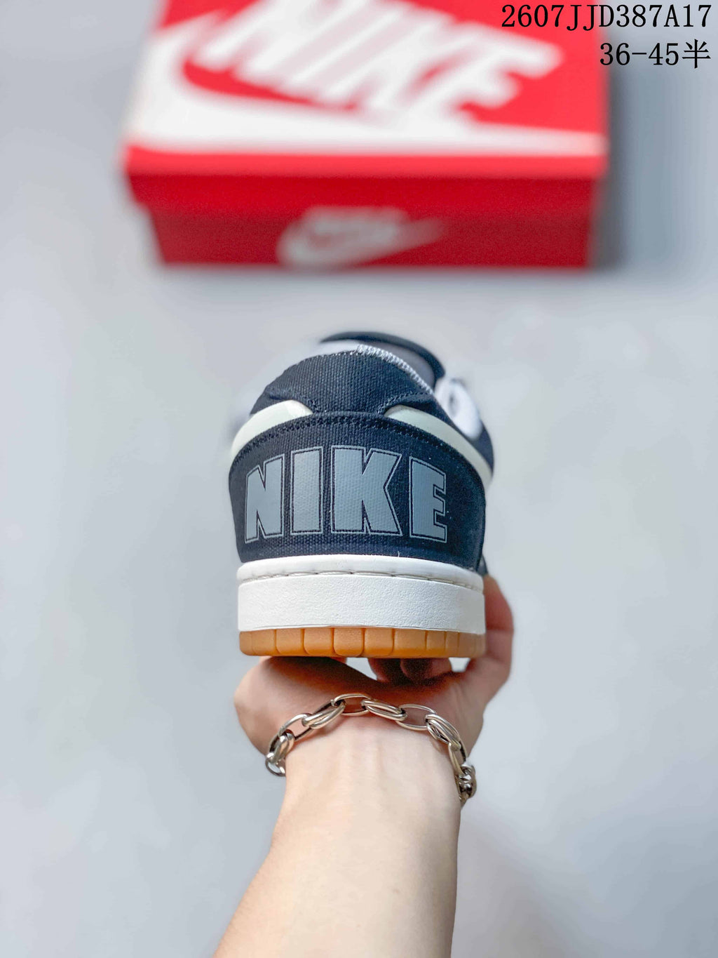 Nike Big Nike Low Lux Sneakers in Navy White Gum 2607JJD387A17 - product image from the listing.