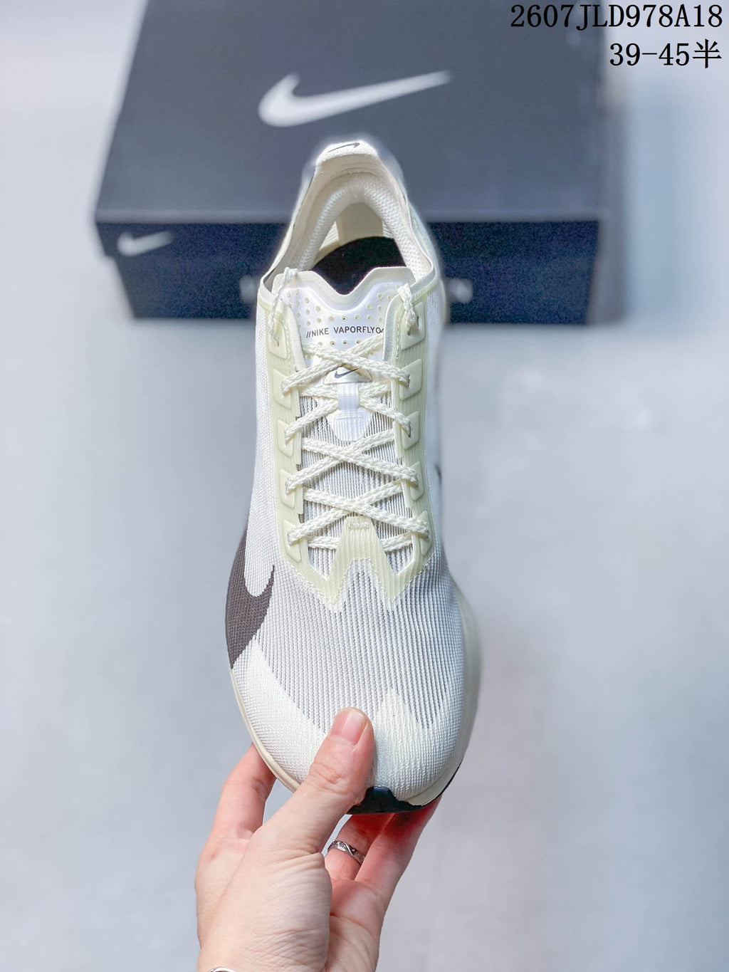 White Nike ZoomX Vaporfly NEXT% 4 Running Shoes - product image from the listing.