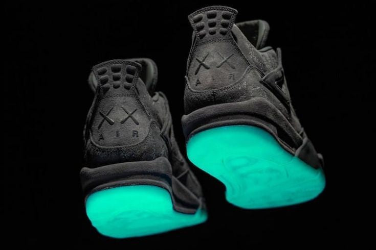 Air Jordan 4 Retro KAWS x 'Cool Grey' - product image from the listing.