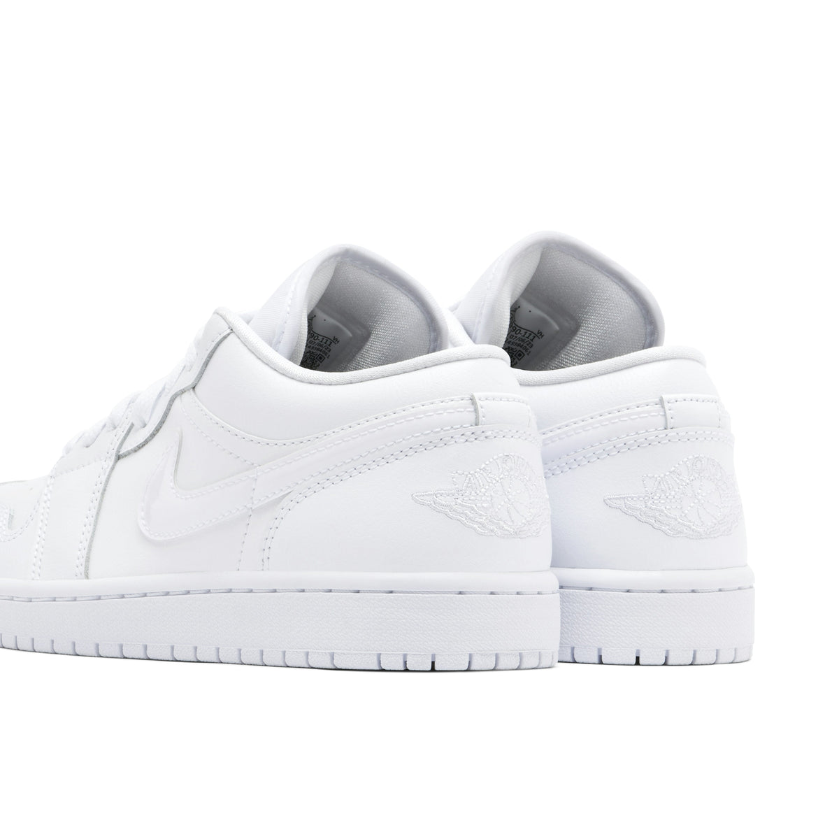 Women's AIR JORDAN 1 LOW TRIPLE WHITE - product image from the listing.