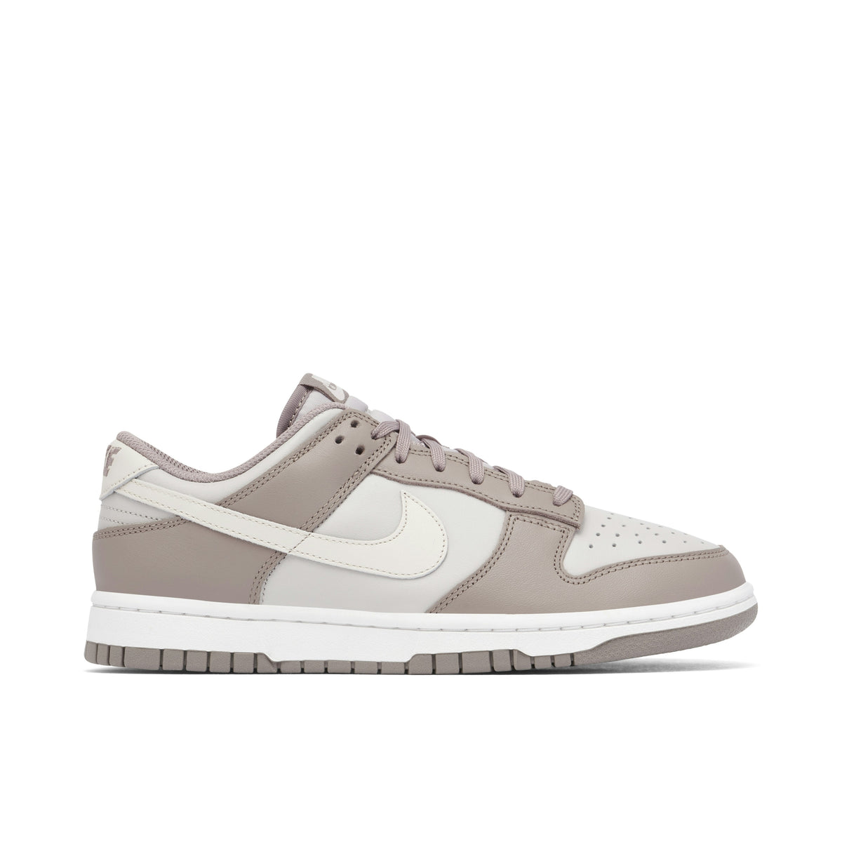 NIKE DUNK LOW in BONE TAN - product photo shown in the listing for this item.