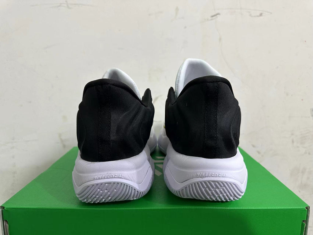 Nike G.T. Cut Academy Basketball Shoes in White Black Gold - product image from the listing.
