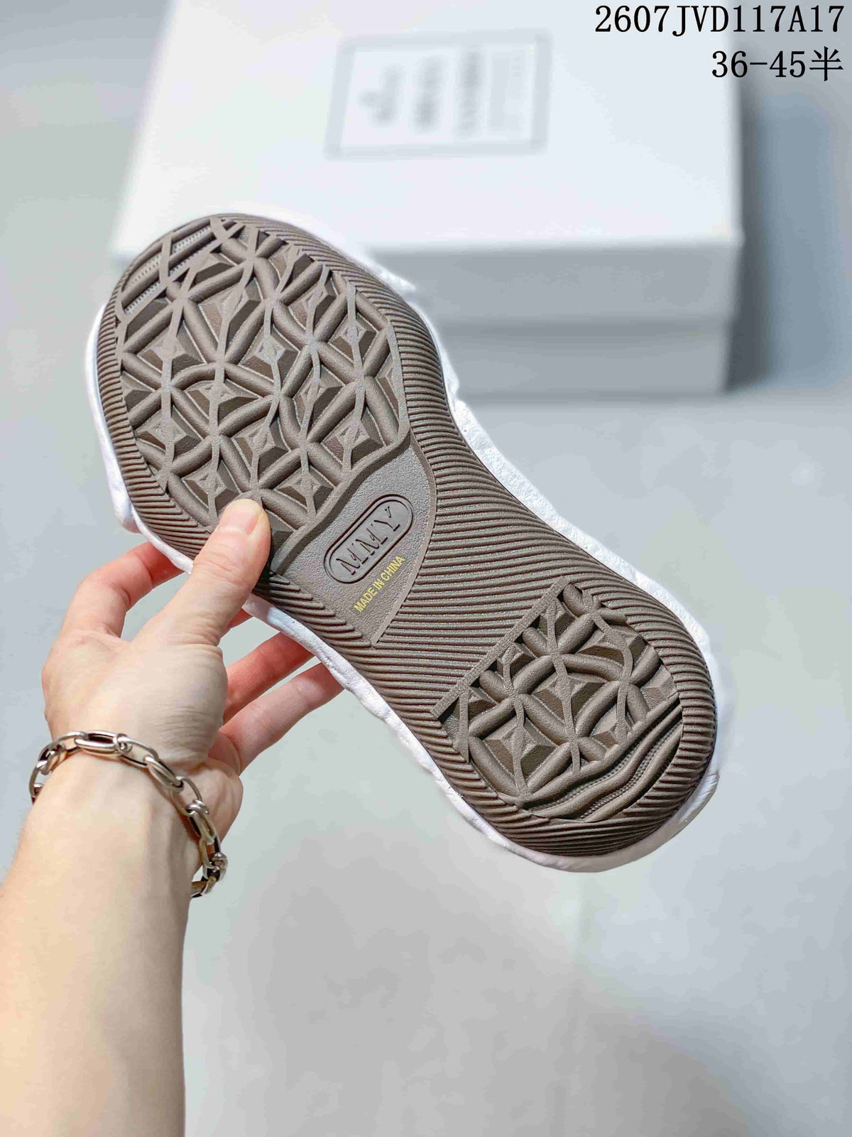 Maison Mihara Yasuhiro Original Sole Low Sneakers in Black White - product image from the listing.