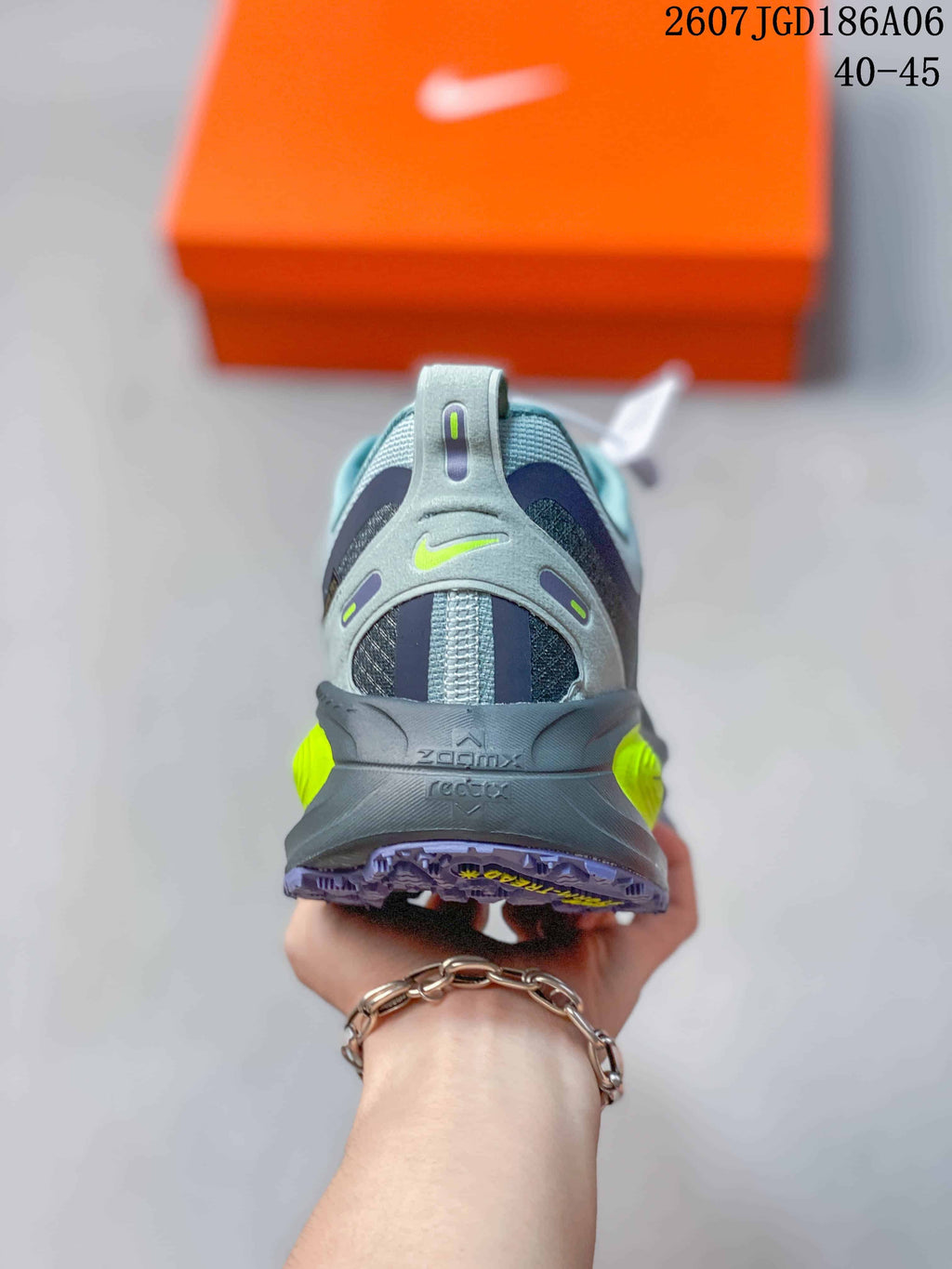 Nike Vomero Plus Run Running Sneakers in Gray - product image from the listing.