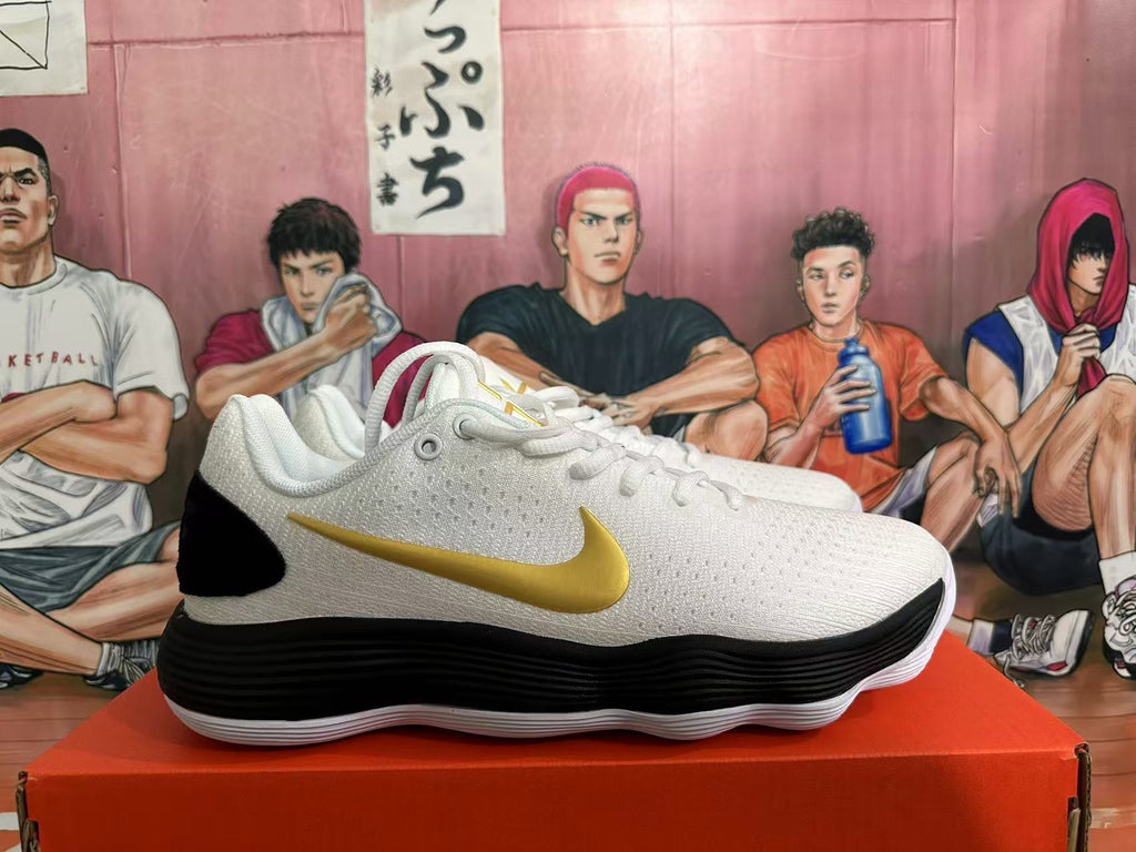 Nike Basketball Shoes in White Black Gold - product image from the listing.