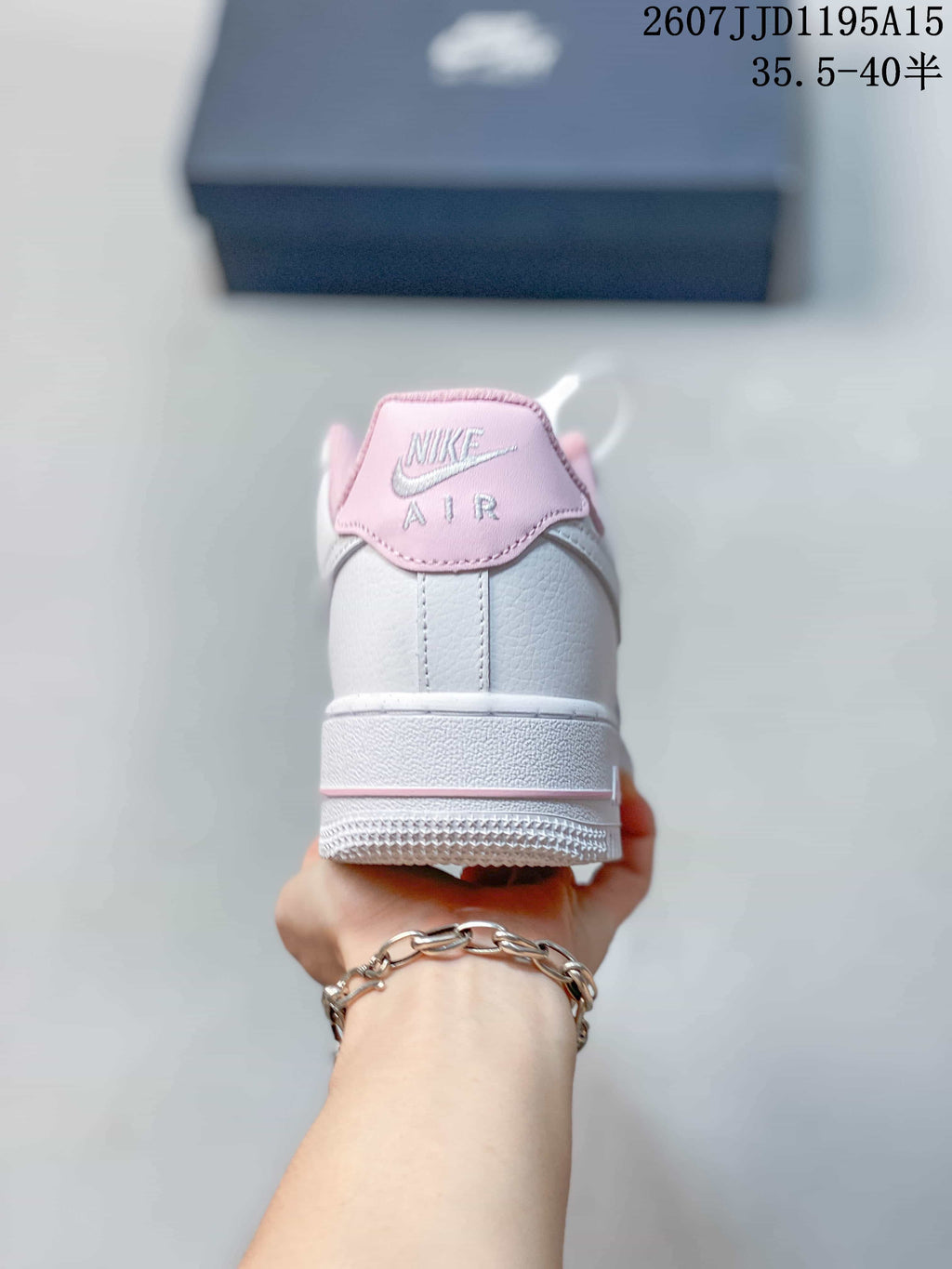 Nike Air Force 1 '07 Low Sneakers in White Pink HV4403 - product image from the listing.
