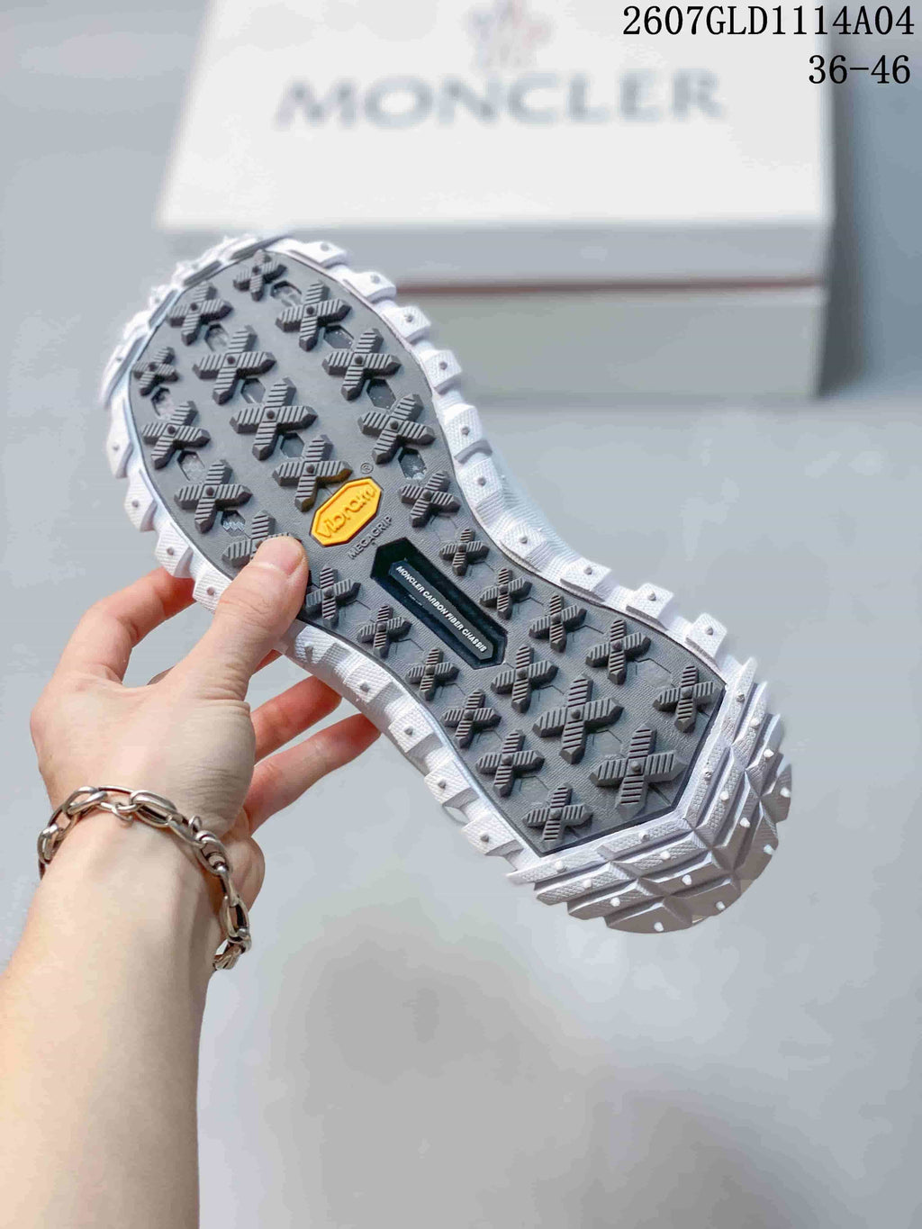 Moncler Pacey Low-Top Sneakers in White 2607GLD1114A04 - product image from the listing.