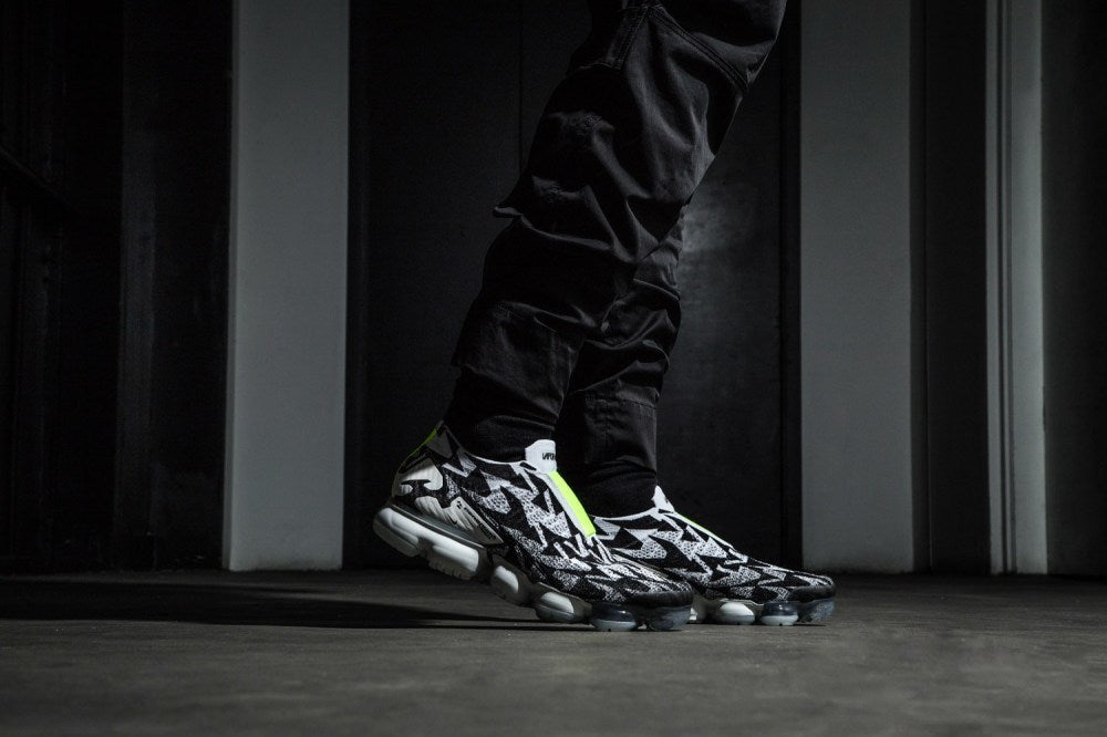 Nike Air VaporMax Moc 2 Acronym in Black White Volt AQ0996-001 - product image from the listing.