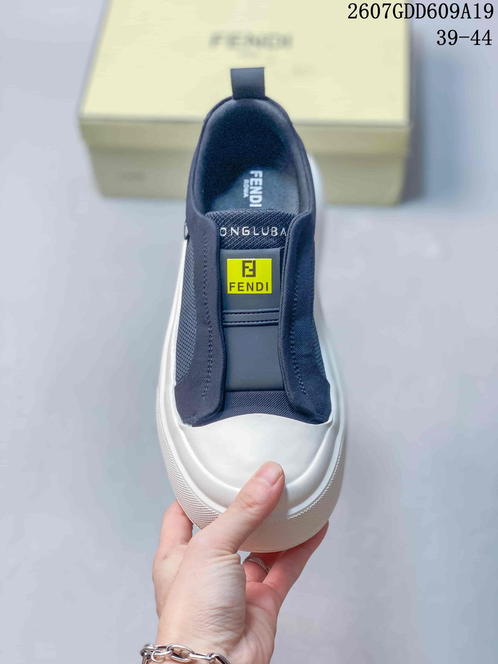 Fendi Navy and White Slip-On Trainers - product image from the listing.
