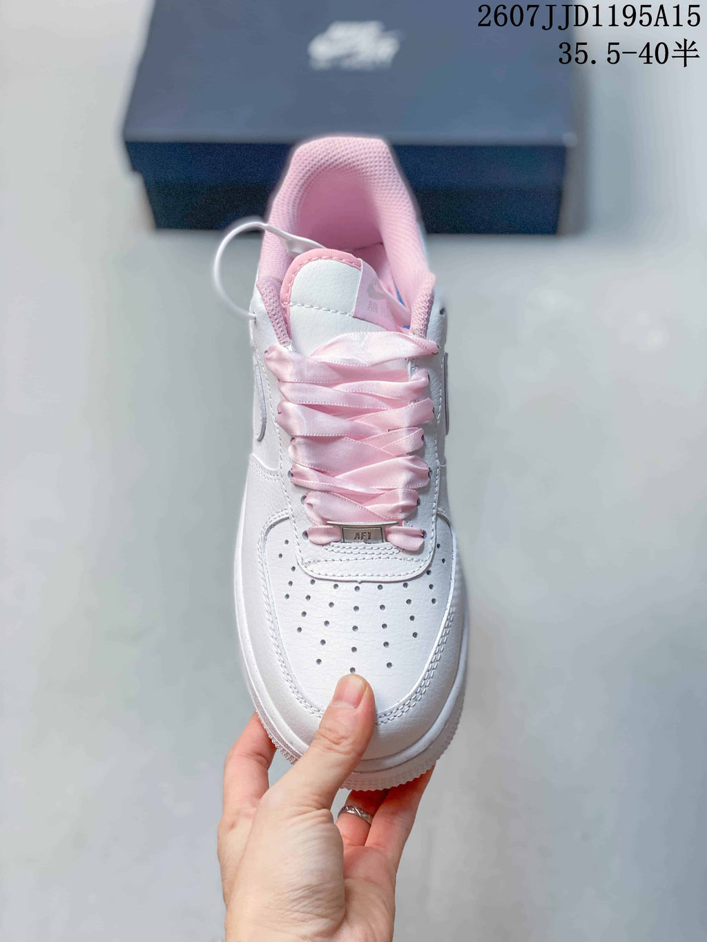 Nike Air Force 1 '07 Low Sneakers in White Pink HV4403 - product image from the listing.