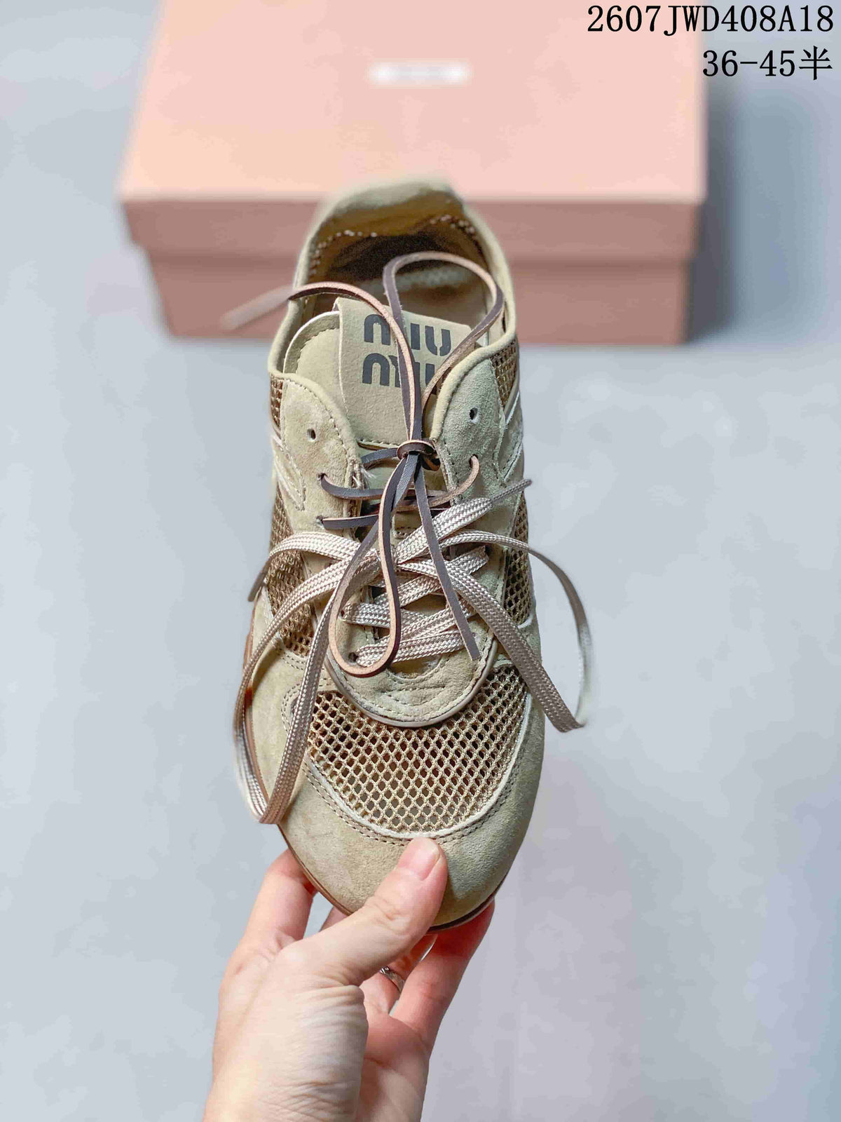 Miu Miu Gymnasium Low-Cut Sneakers Beige Sage 2607JWD408A18 - product image from the listing.