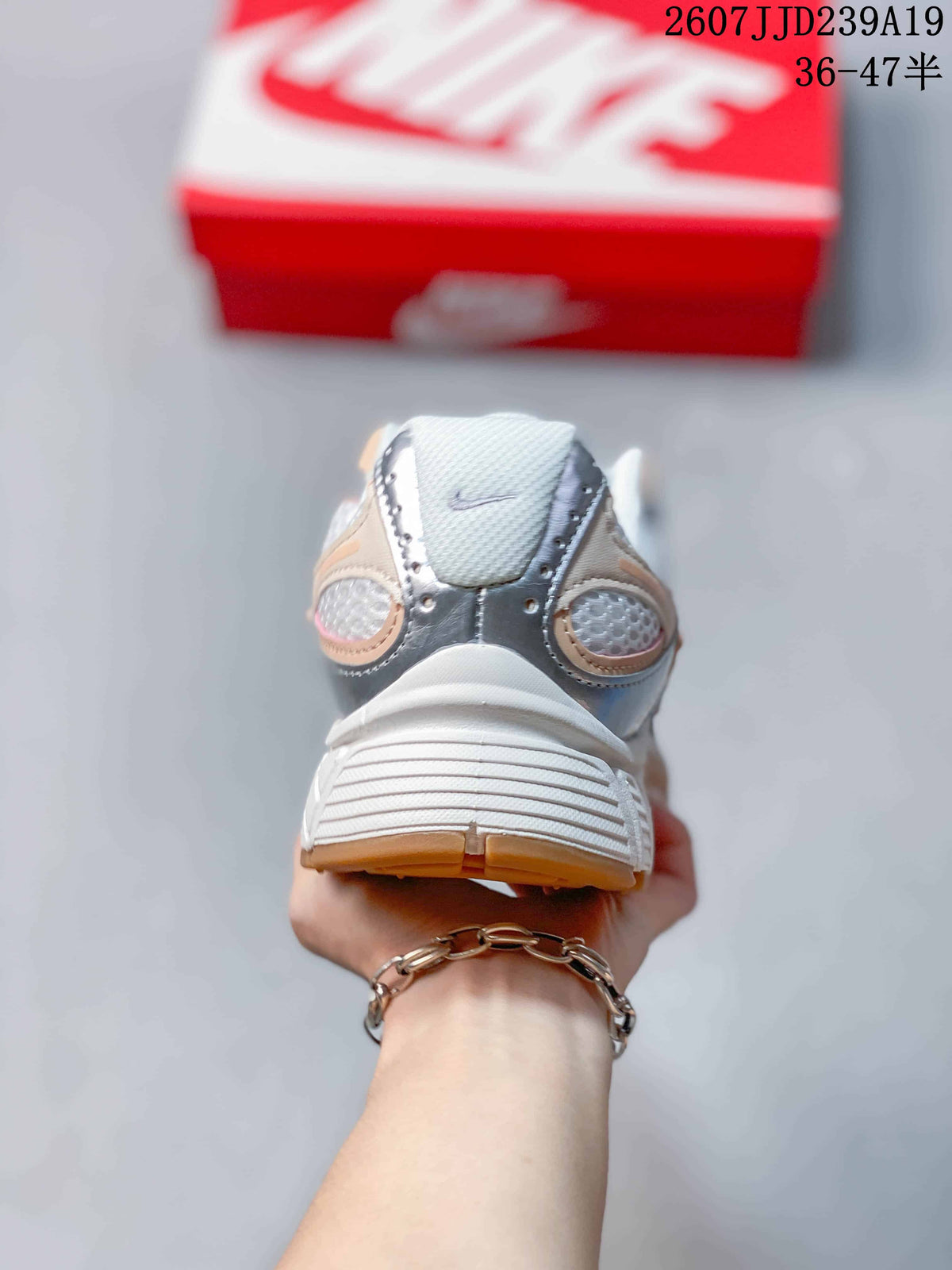 Nike V5 RNR Running Shoes in White Peach Silver 711190RRY - product image from the listing.