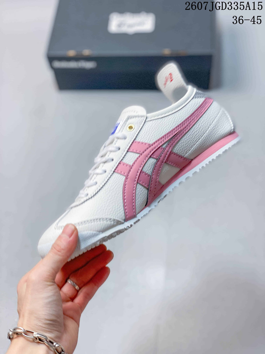 Onitsuka Tiger Mexico 66 Deluxe Sneakers in White Pink 2607JGD335A15 - product image from the listing.