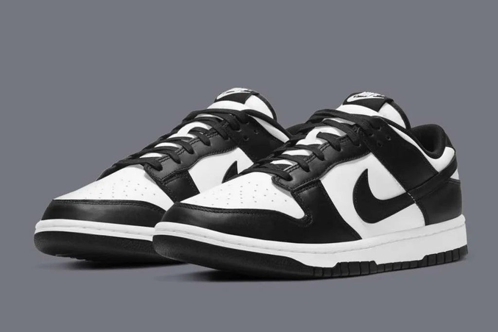 Dunk Low Retro White Black Panda Trainers - product image from the listing.