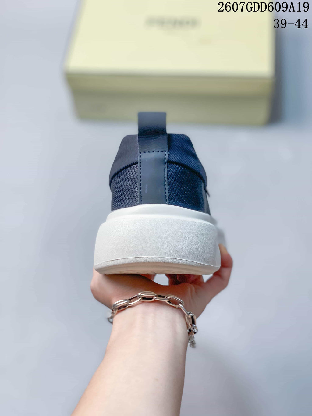 Fendi Navy and White Slip-On Trainers - product image from the listing.
