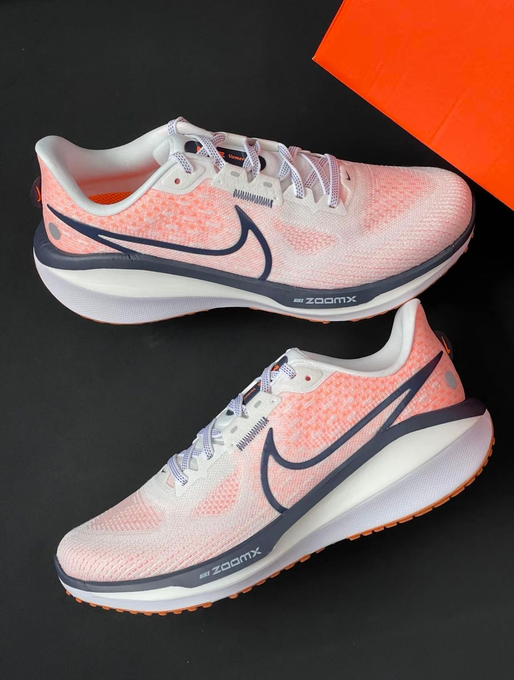 Nike Air Zoom Vomero 17 Running Shoes in White Orange FB1309-102 - product image from the listing.
