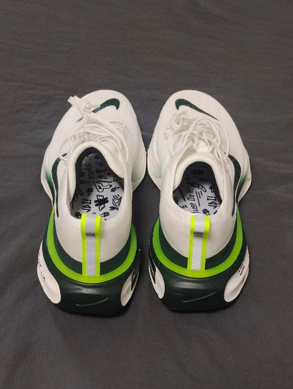 Nike ZoomX Invincible Run 3 Running Shoes in White Green FZ4018-100 - product image from the listing.