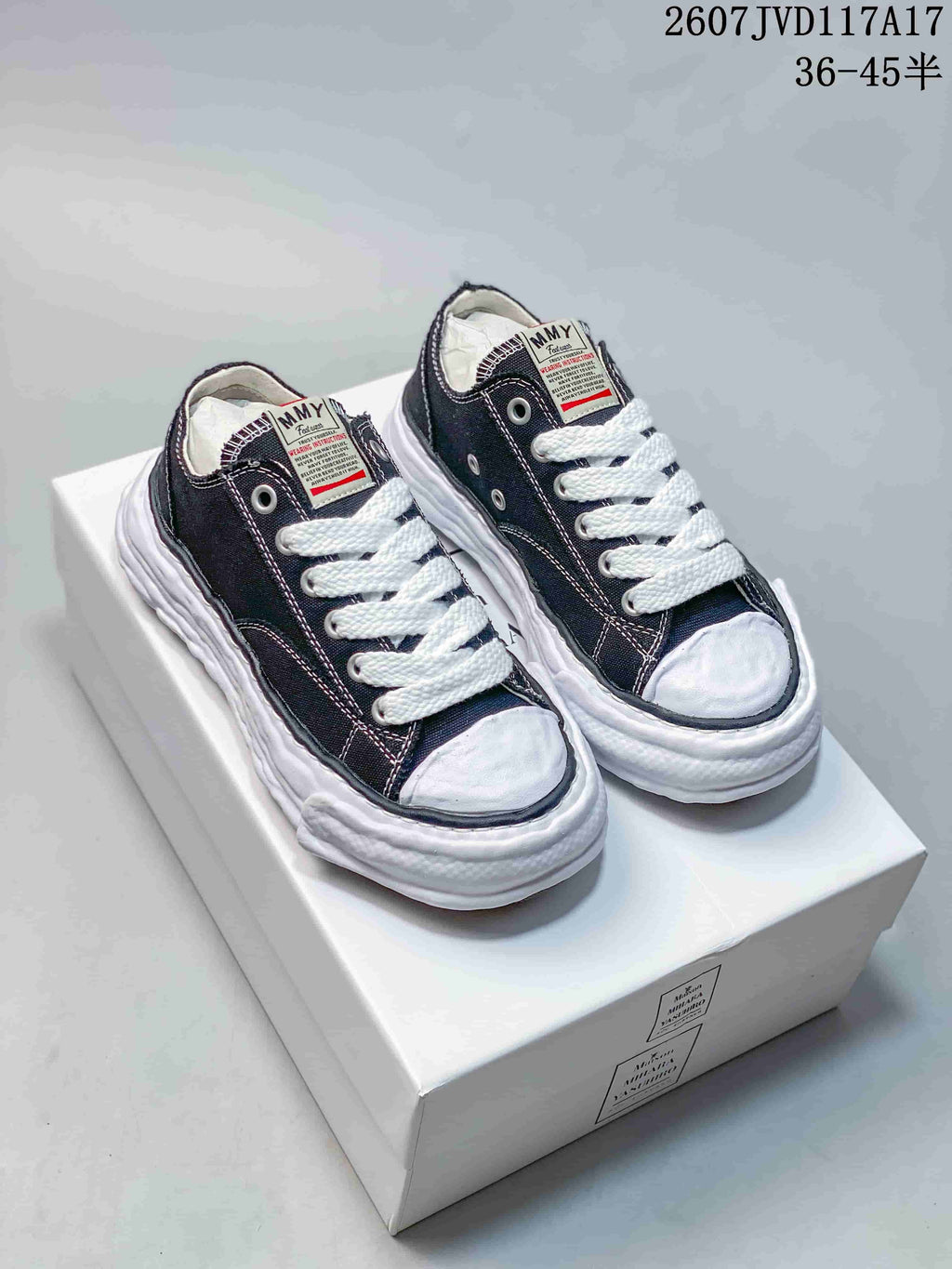 Maison Mihara Yasuhiro Original Sole Low Sneakers in Black White - product image from the listing.