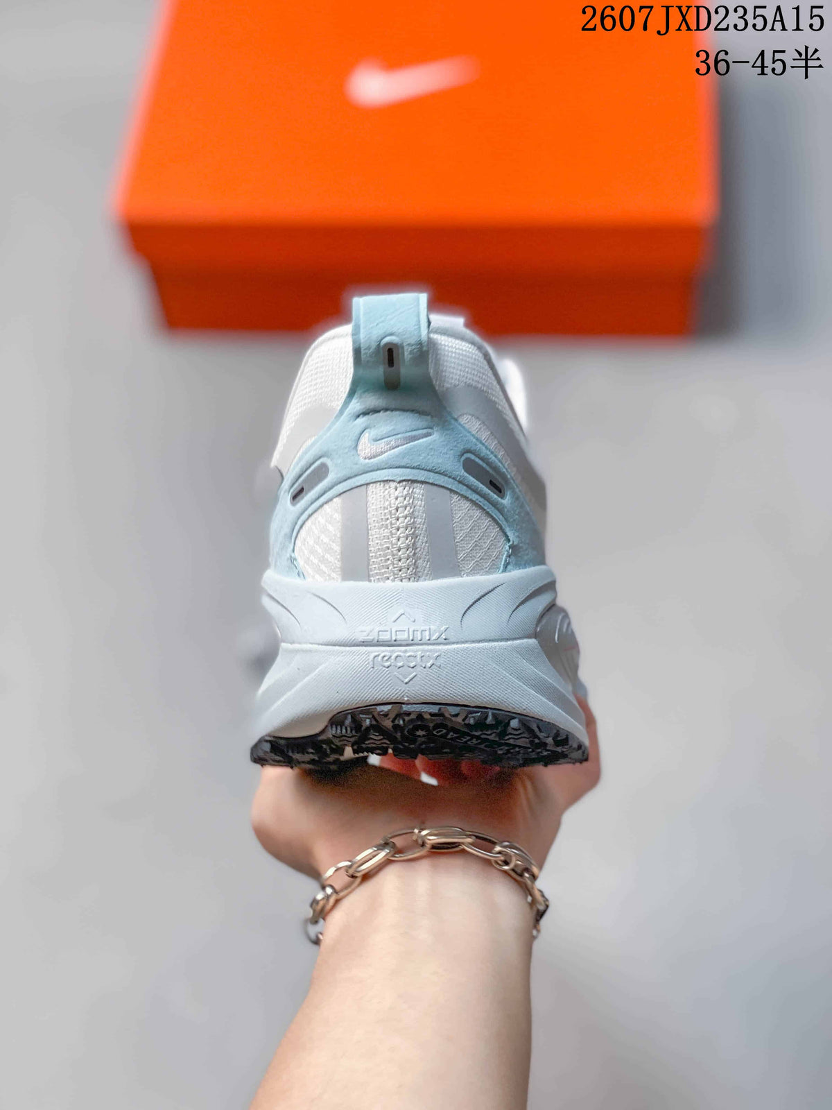 Nike Air Zoom Vomero 18 GTX Running Shoes in White Light Blue - product image from the listing.