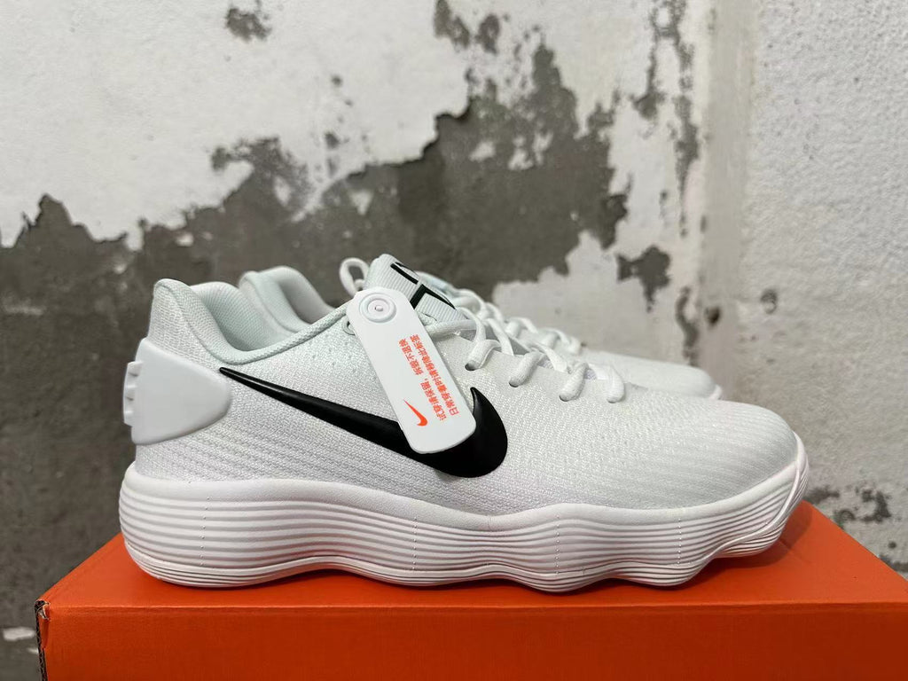 Nike White Basketball Footwear with Black Swoosh - product image from the listing.