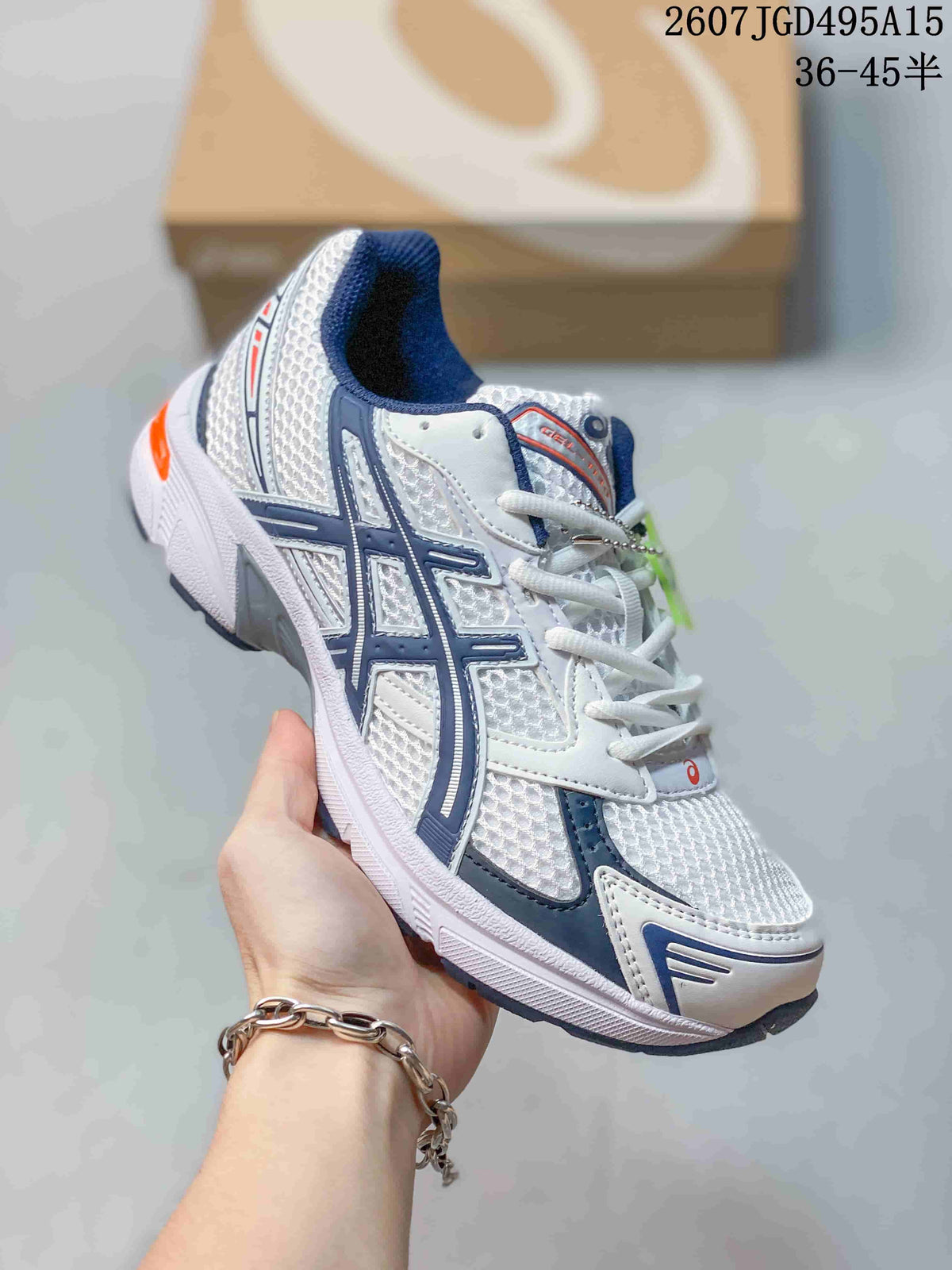 ASICS GEL-1130 Sneakers in White Navy Orange 2607JGD495A15 - product image from the listing.