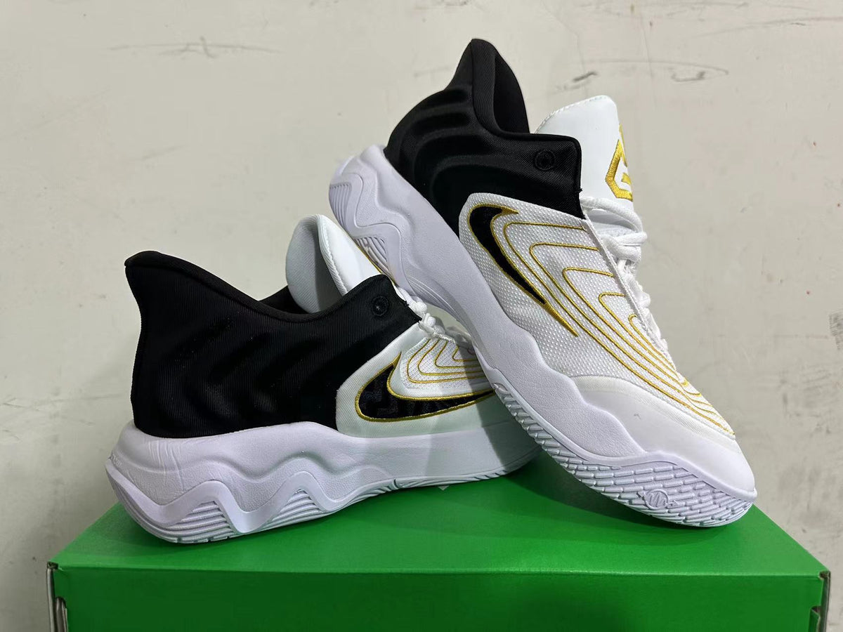 Nike G.T. Cut Academy Basketball Shoes in White Black Gold - product image from the listing.