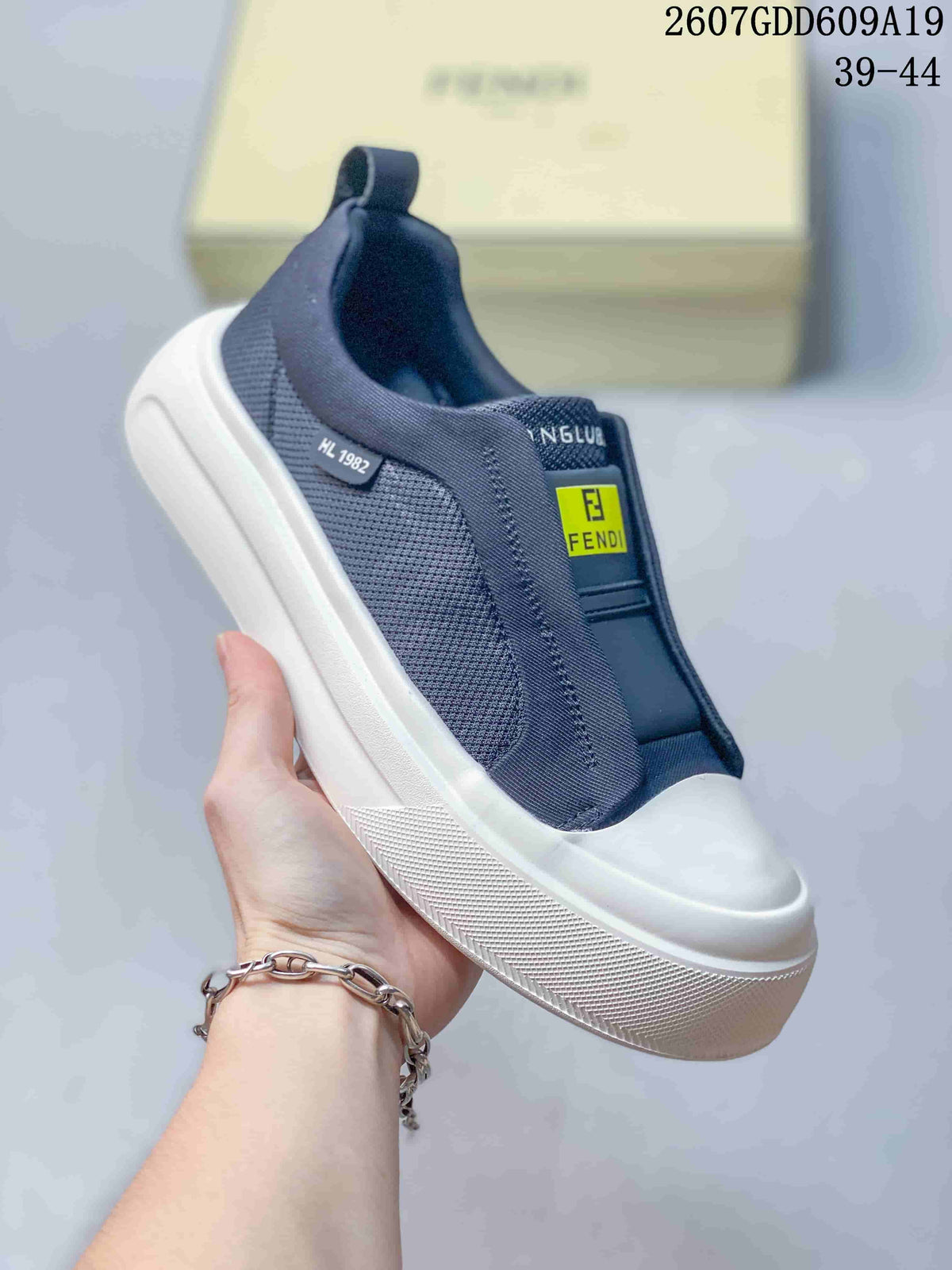 Fendi Navy and White Slip-On Trainers - product image from the listing.