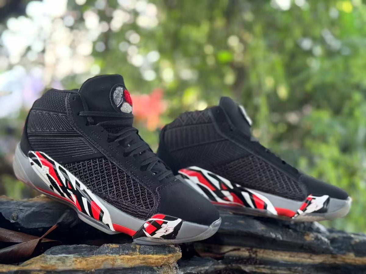 Jordan XXXVIII Playoffs 23 Basketball Shoes in Black Red - product image from the listing.