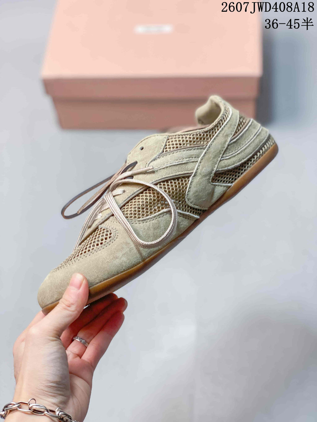 Miu Miu Gymnasium Low-Cut Sneakers Beige Sage 2607JWD408A18 - product image from the listing.