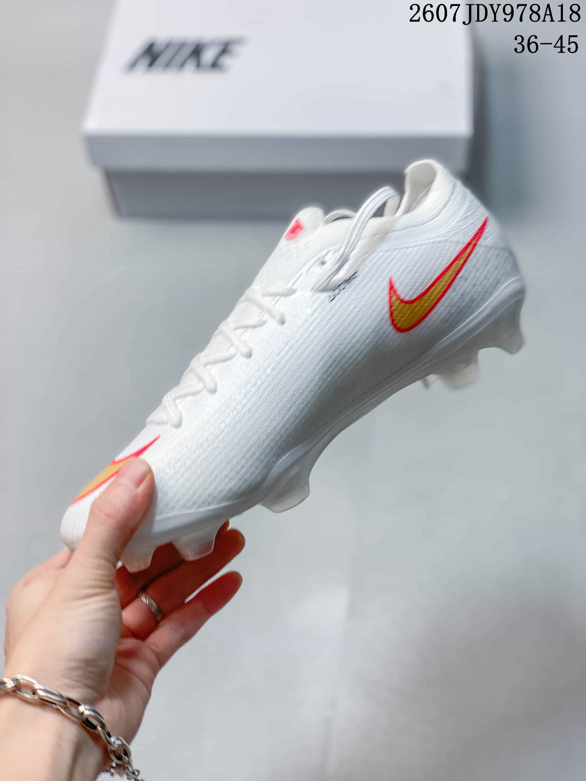 Mercurial Vapor 16 Air Zoom Elite AG-PRO Soccer Cleats by Nike - product image from the listing.