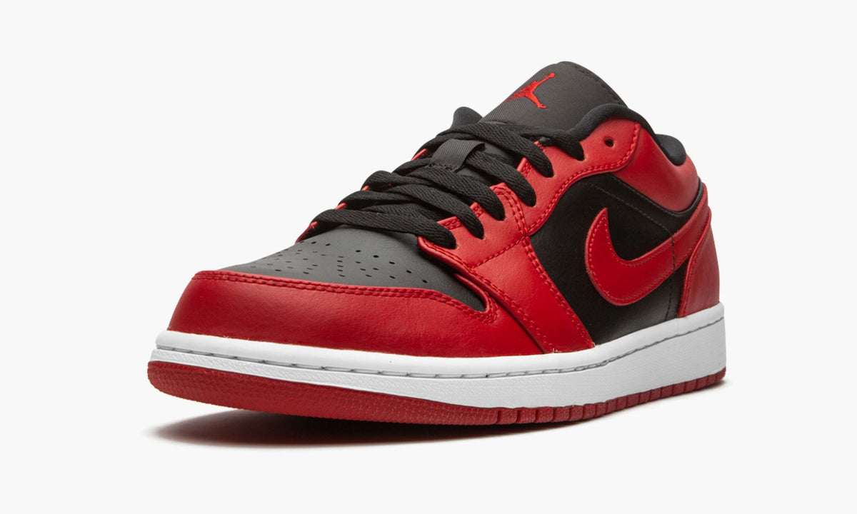 "Reverse Bred" Jordan 1 Low Sneakers - product image from the listing.