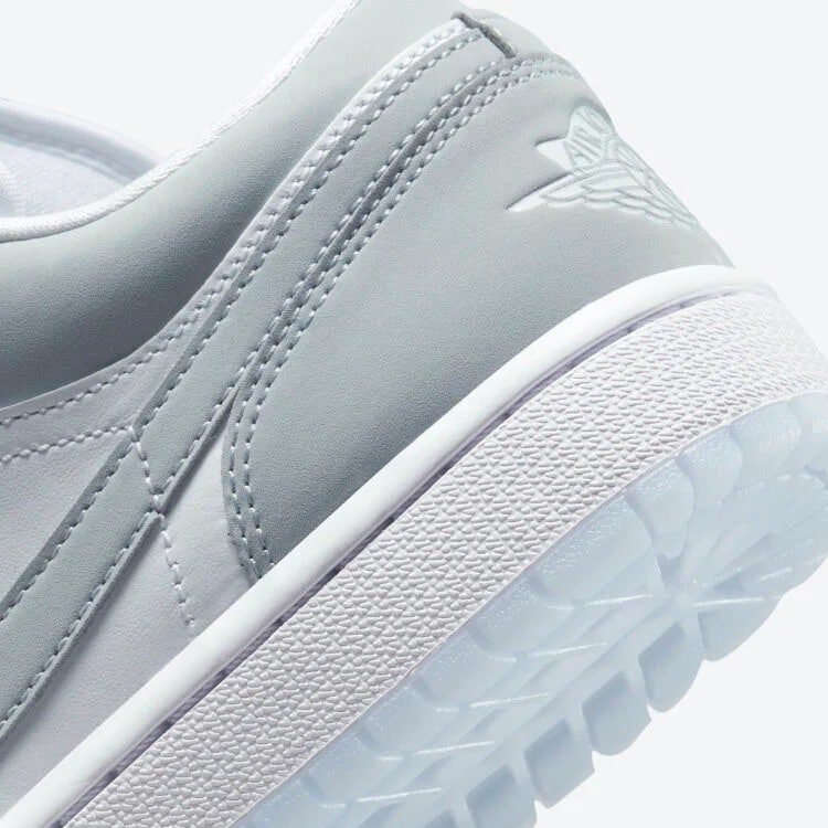Jordan 1 Low Sneakers in Wolf Grey - product image from the listing.