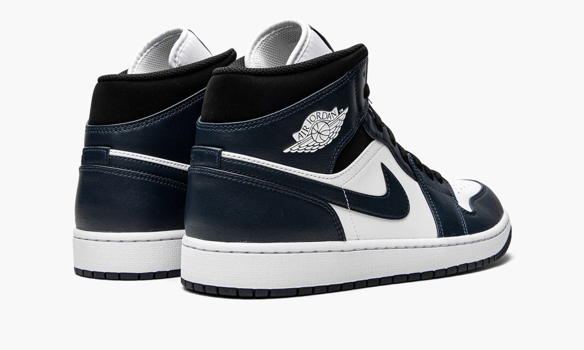 Jordan 1 Mid Armory Sneakers in Navy - product image from the listing.