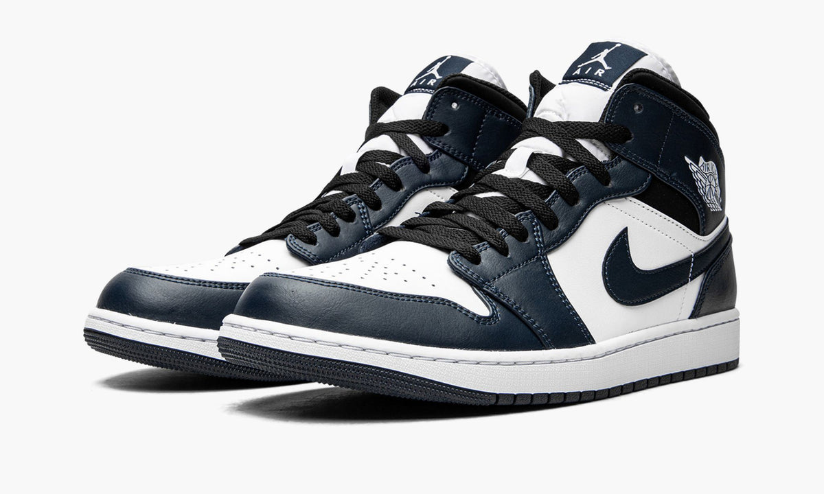 Jordan 1 Mid Armory Sneakers in Navy - product image from the listing.