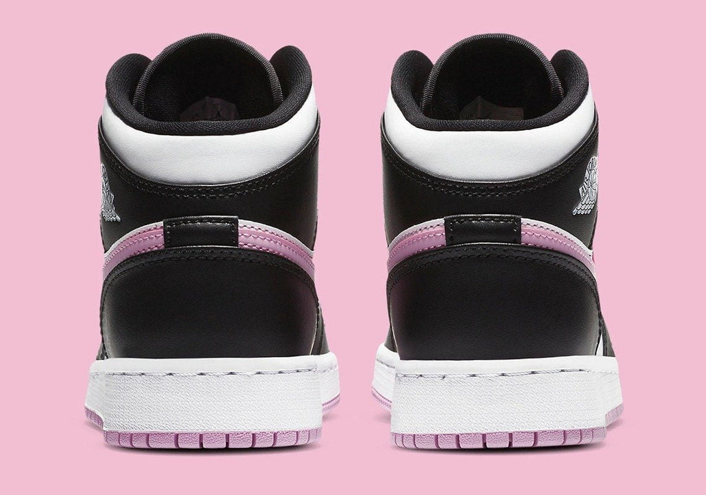 Jordan 1 Mid White Black Light Arctic Sneakers in Pink - product image from the listing.