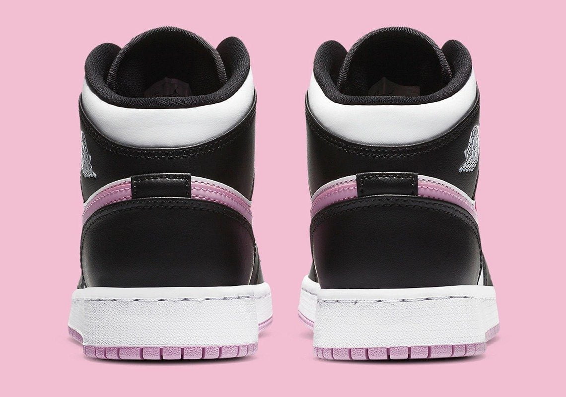 Jordan 1 Mid White Black Light Arctic Sneakers in Pink - product image from the listing.
