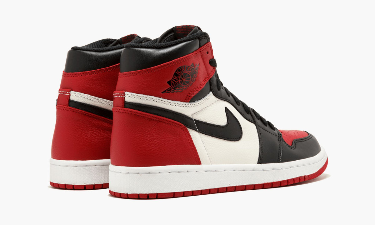 "Bred Toe" Jordan 1 Retro High Sneakers - product image from the listing.