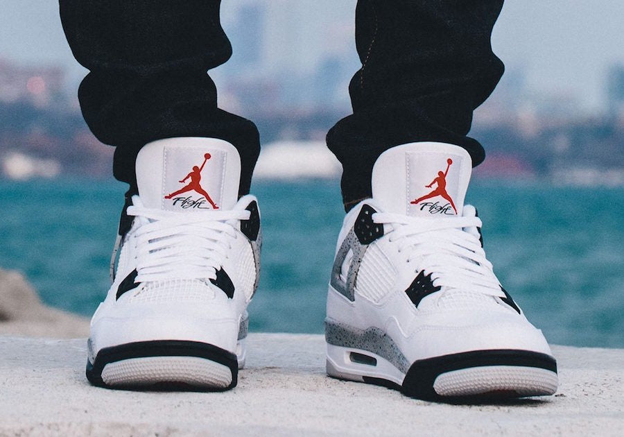 Golf White Cement Sneakers - Jordan 4 Retro - product image from the listing.