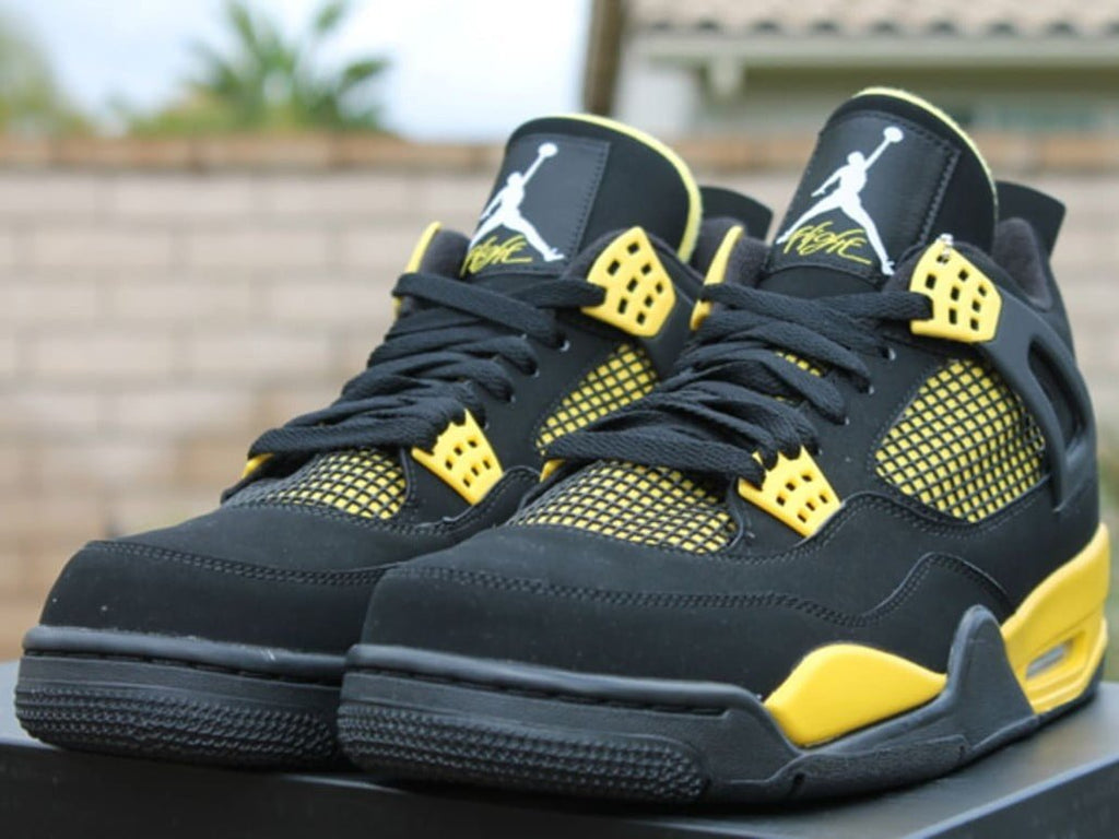 Thunder (2023) Sneakers - Jordan 4 Retro - product image from the listing.
