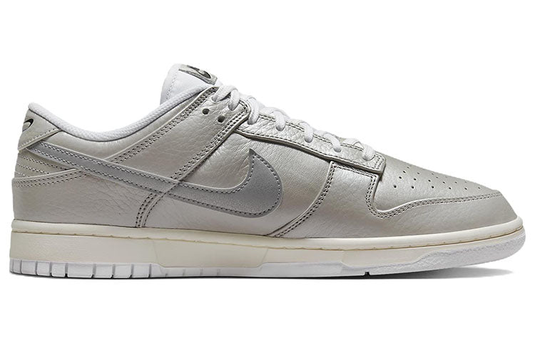 Nike Dunk Low Sneakers in Metallic Silver - product image from the listing.