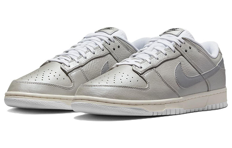 Nike Dunk Low Sneakers in Metallic Silver - product image from the listing.