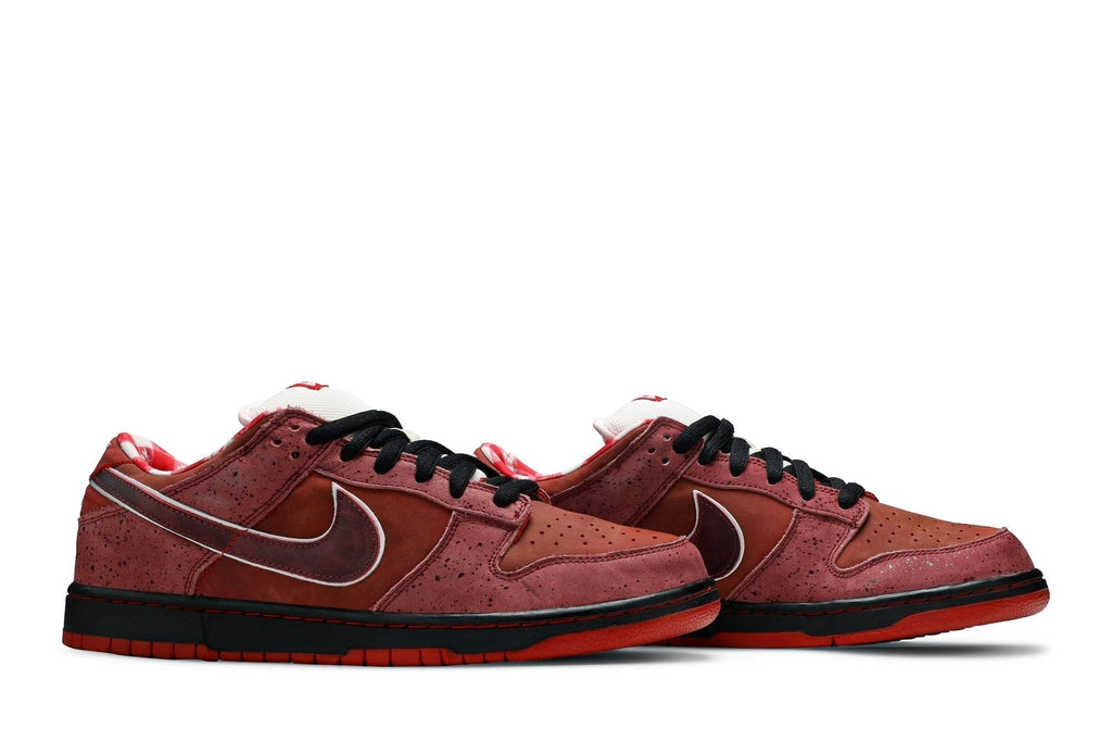 Nike Dunk SB Low Red Lobster Trainers - product image from the listing.