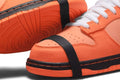Nike SB Dunk Low Concepts Orange Lobster Trainers - product image from the listing.