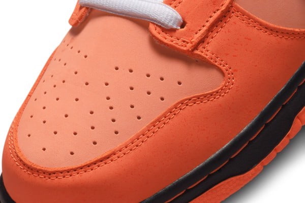 Nike SB Dunk Low Concepts Orange Lobster Trainers - product image from the listing.