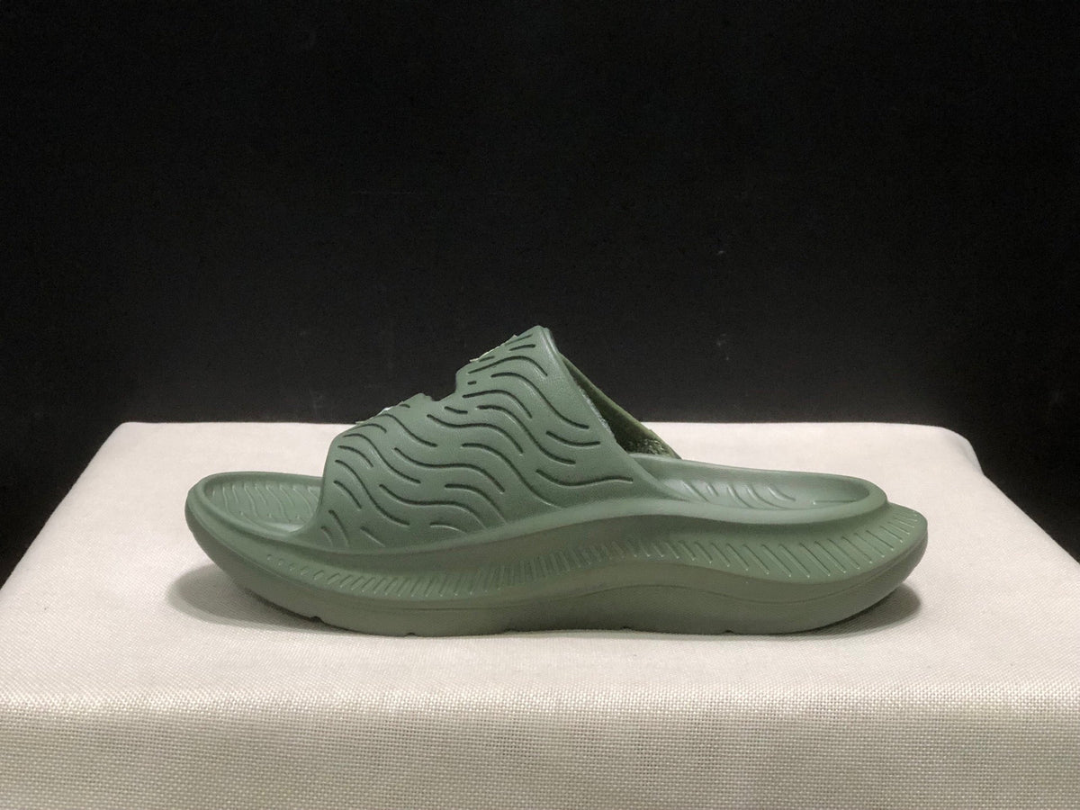 WTAPS x HOKA ONE ONE Ora Luxe Slide Sandals - product image from the listing.