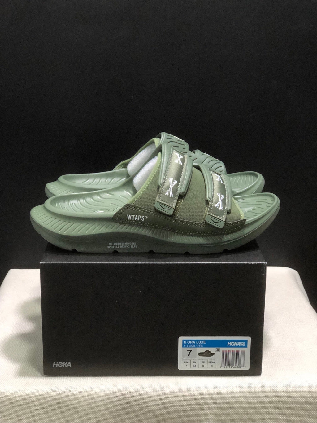 WTAPS x HOKA ONE ONE Ora Luxe Slide Sandals - product image from the listing.