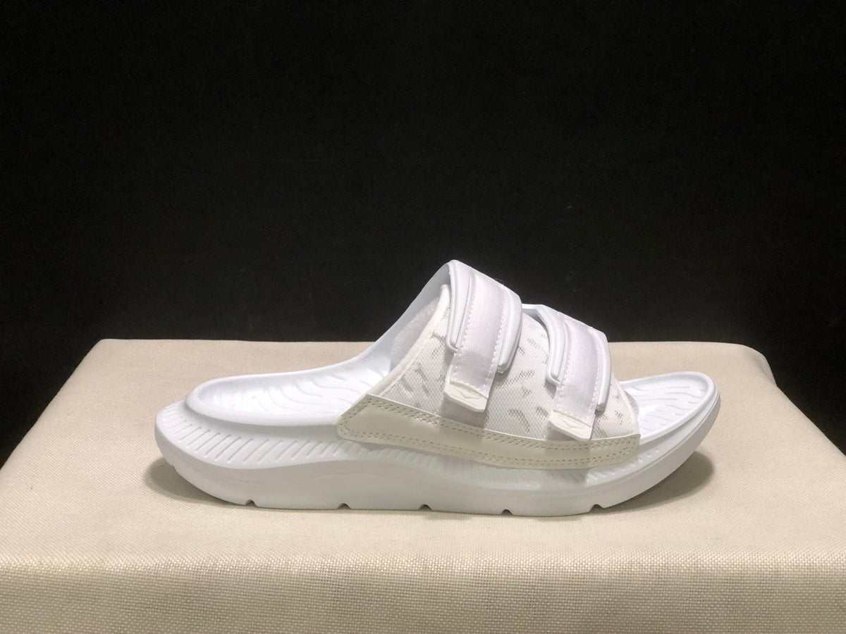 WTAPS x HOKA ONE ONE Ora Luxe Slide Sandals - product image from the listing.