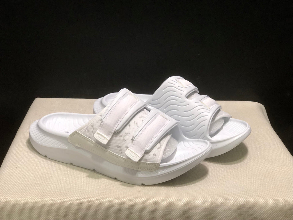 WTAPS x HOKA ONE ONE Ora Luxe Slide Sandals - product image from the listing.