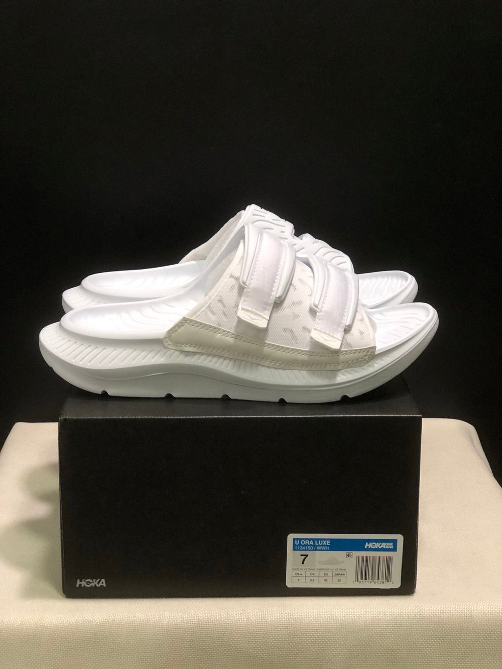 WTAPS x HOKA ONE ONE Ora Luxe Slide Sandals - product image from the listing.