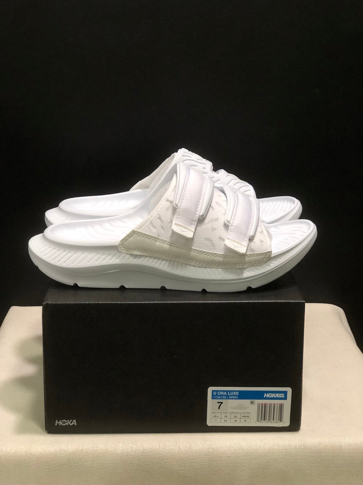 WTAPS x HOKA ONE ONE Ora Luxe Slide Sandals - product image from the listing.